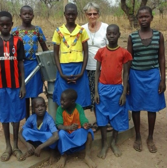 Sr Rita Grunke FDNSC, project supervisor for the garden irrigation systems in Mapuordit, South Sudan, with students from the region.