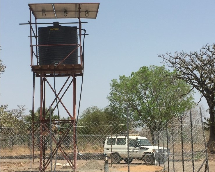 The water tank with solar panels providing essential irrigation for the garden in Aluakluak, Mapuordit.