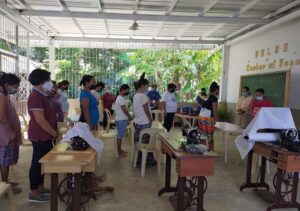 People from the indigenous Badjao group join a training group run by OLSH Sisters in Surigao, in order to learn practical skills that will help them to earn money now that they are unable to go fishing, an important source of food and income for their tribes.